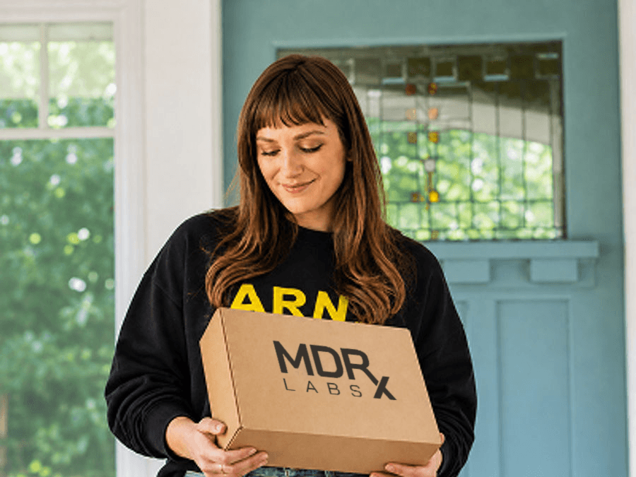 Member receiving a MDRxLabs delivery